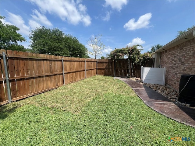 view of yard with fence