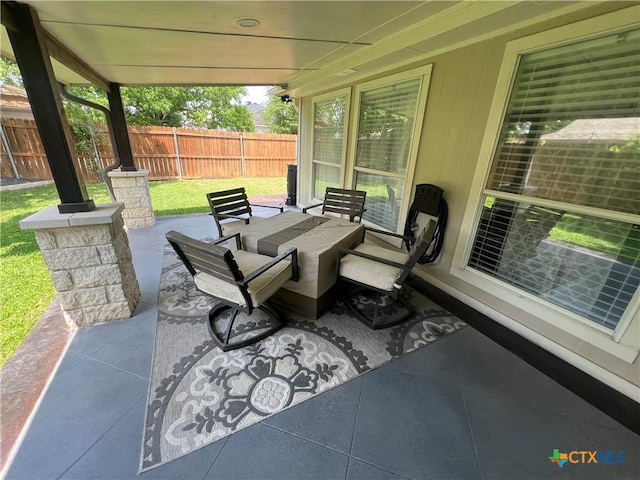 view of patio with fence