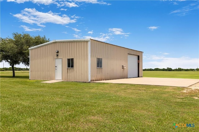 99 N Seakist Ln, Port Lavaca, TX 77979 - view of outdoor structure featuring concrete driveway