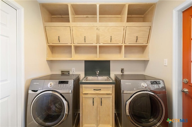 99 N Seakist Ln, Port Lavaca, TX 77979 - washroom with washer / dryer and cabinet space