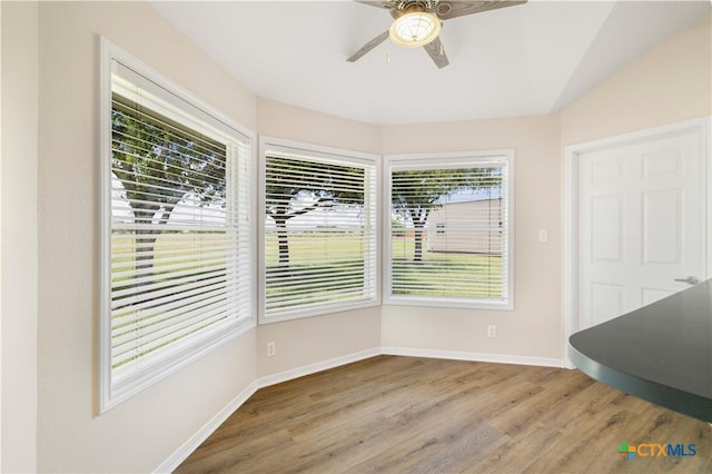 99 N Seakist Ln, Port Lavaca, TX 77979 - unfurnished dining area with a ceiling fan and wood finished floors