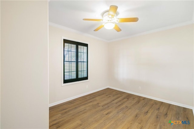 99 N Seakist Ln, Port Lavaca, TX 77979 - spare room with wood finished floors, ornamental molding, and a ceiling fan