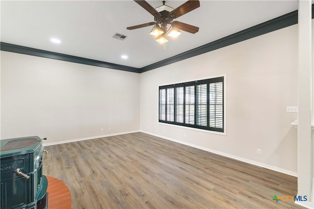 99 N Seakist Ln, Port Lavaca, TX 77979 - unfurnished living room featuring ornamental molding, ceiling fan, wood finished floors, and recessed lighting