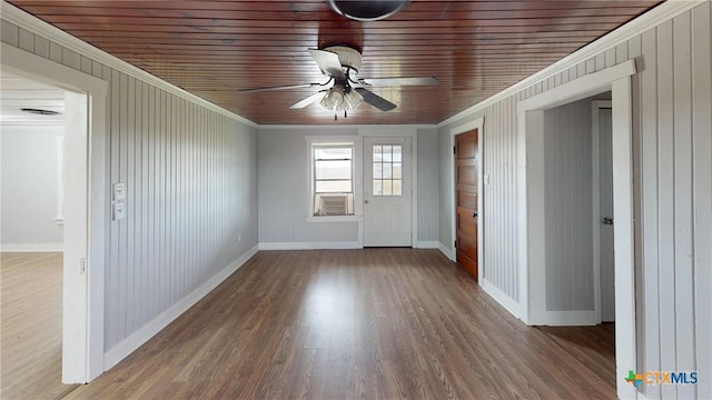 spare room with crown molding, hardwood / wood-style floors, ceiling fan, and wooden ceiling