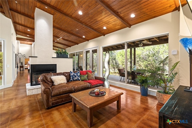 10329 Montanio Dr, New Braunfels, TX 78132 - living room with wooden ceiling, healthy amount of natural light, concrete flooring, a multi sided fireplace, and recessed lighting