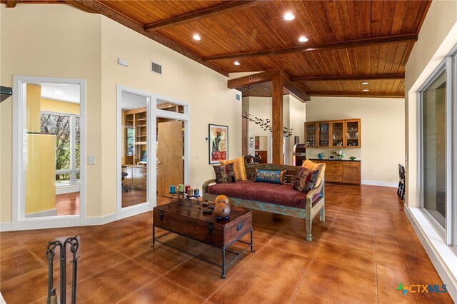 10329 Montanio Dr, New Braunfels, TX 78132 - living area featuring a wooden ceiling with exposed beams, recessed lighting, concrete flooring, and high vaulted ceiling