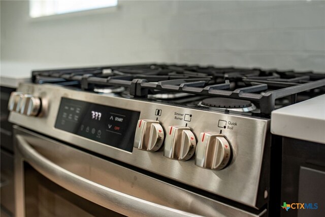 room details with stainless steel range with gas stovetop