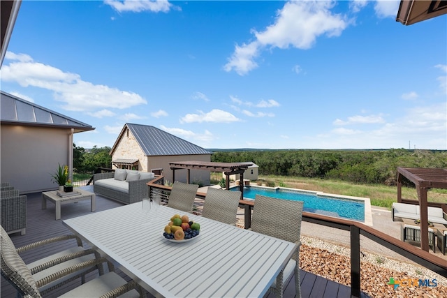 view of swimming pool featuring a patio area and an outdoor hangout area