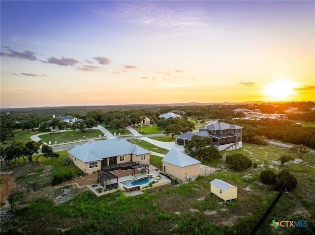 view of aerial view at dusk