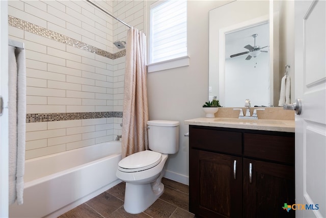 full bathroom featuring toilet, hardwood / wood-style floors, vanity, and shower / bath combination with curtain