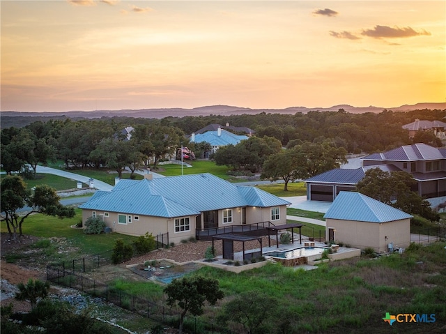 view of aerial view at dusk