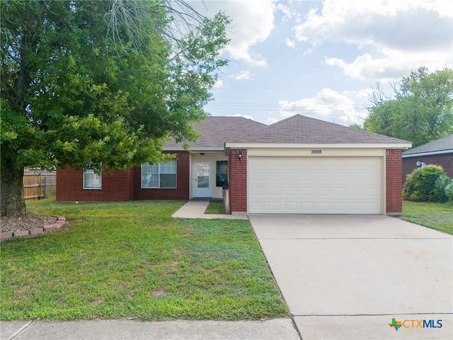 ranch-style home with a front yard and a garage