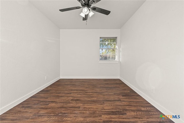 unfurnished room featuring ceiling fan, lofted ceiling, and dark wood-type flooring