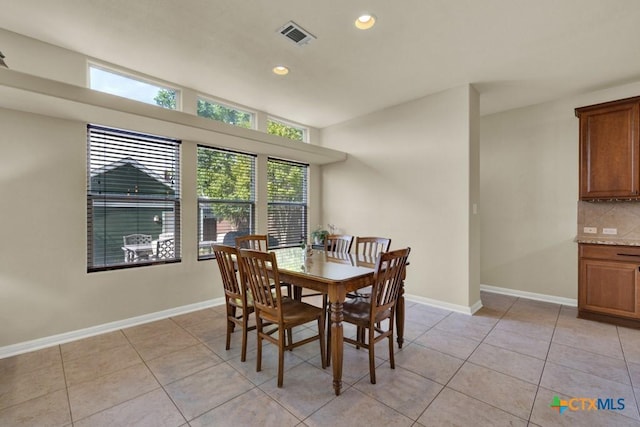 dining space with recessed lighting, light tile patterned flooring, visible vents, and baseboards