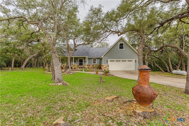 view of front of house with a front lawn and a garage
