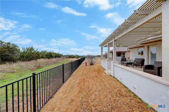 view of yard featuring an outdoor hangout area and a pergola