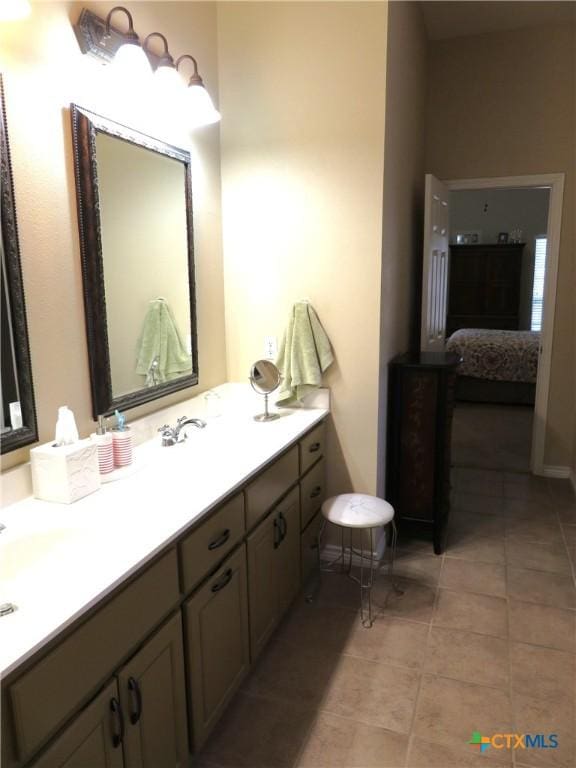 bathroom featuring vanity and tile patterned flooring