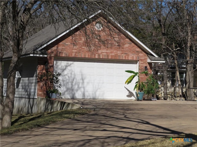 view of property exterior with a garage