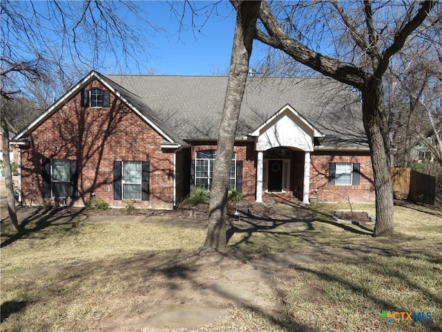 view of front of property with a front lawn