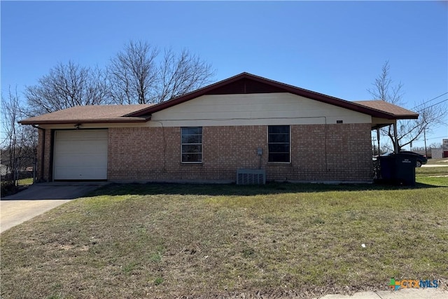 view of home's exterior featuring brick siding, a lawn, concrete driveway, and a garage