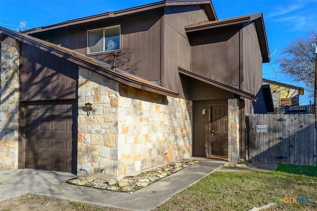 property entrance with a garage