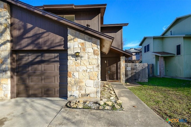 doorway to property featuring a yard