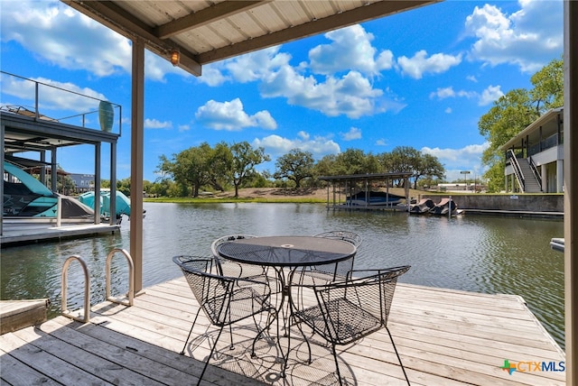 view of dock with a water view