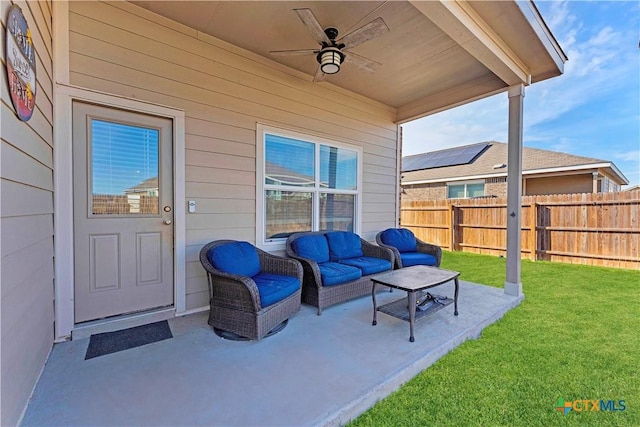 view of patio featuring ceiling fan