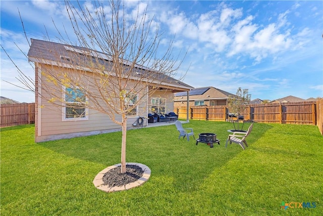 view of yard with an outdoor fire pit