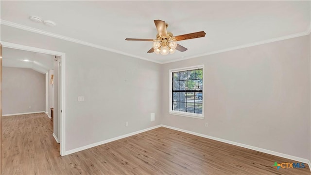 empty room featuring ceiling fan, light hardwood / wood-style floors, and ornamental molding