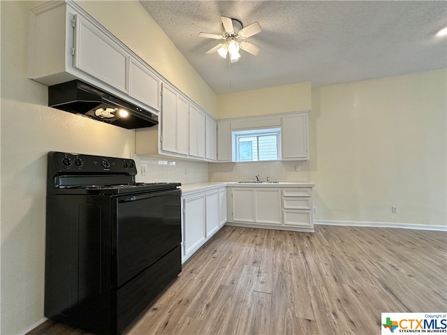 kitchen featuring white cabinetry, light hardwood / wood-style floors, tasteful backsplash, and electric range