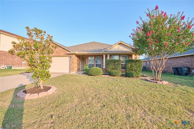 ranch-style home with a front yard and a garage