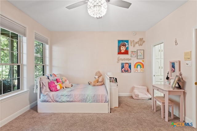 carpeted bedroom with ceiling fan