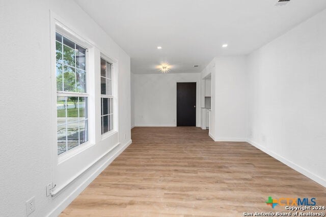 hallway featuring light wood-type flooring