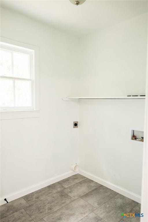 1004 Buena Vista Ave, Victoria, TX 77901 - laundry area featuring hookup for a washing machine, baseboards, and electric dryer hookup