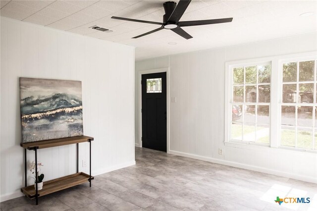 1004 Buena Vista Ave, Victoria, TX 77901 - entrance foyer featuring ceiling fan, wood finished floors, and baseboards