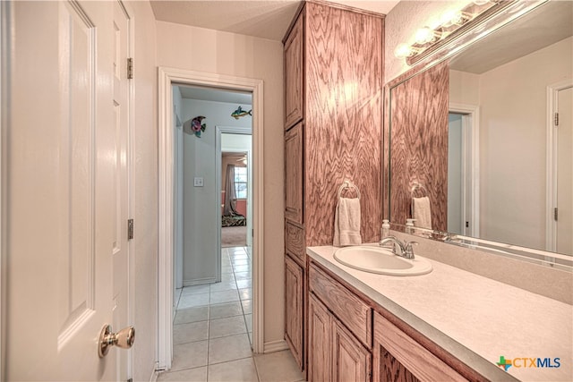 bathroom with vanity and tile patterned floors