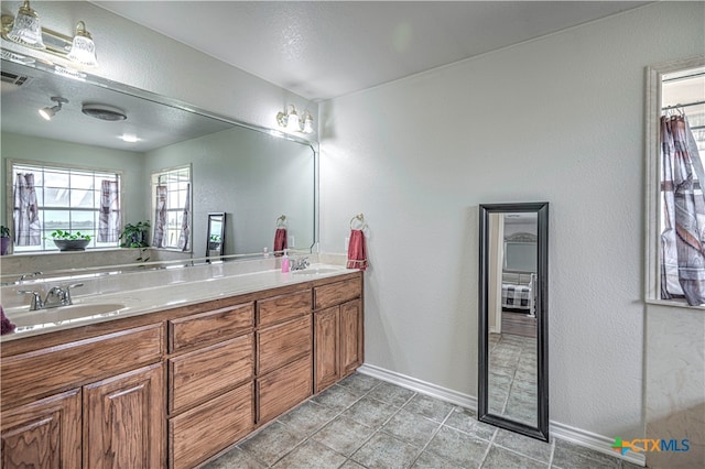 bathroom featuring vanity