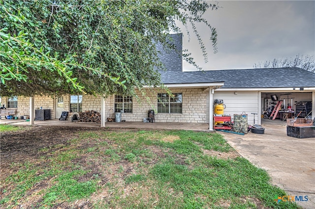 rear view of house featuring a patio area