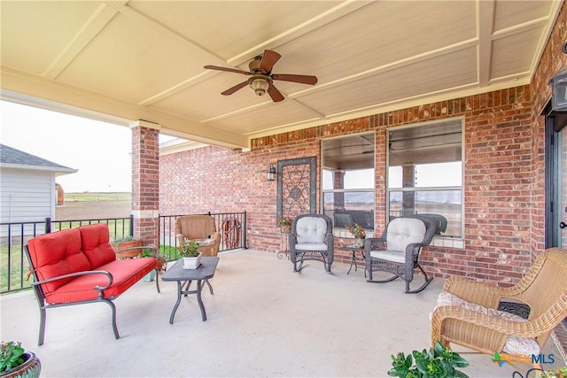 view of patio with ceiling fan and covered porch