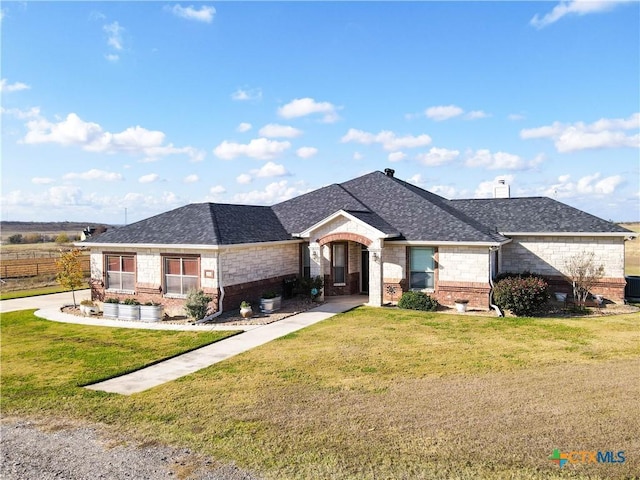 single story home with central AC and a front lawn