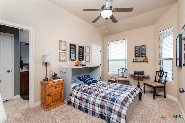 carpeted bedroom featuring ceiling fan and lofted ceiling