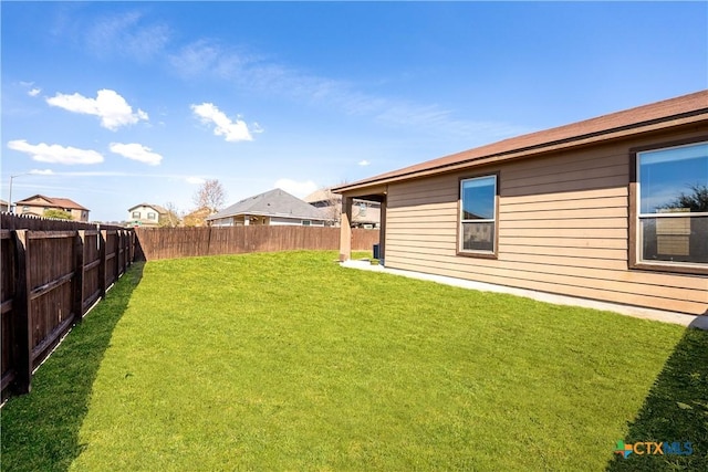 view of yard featuring a fenced backyard