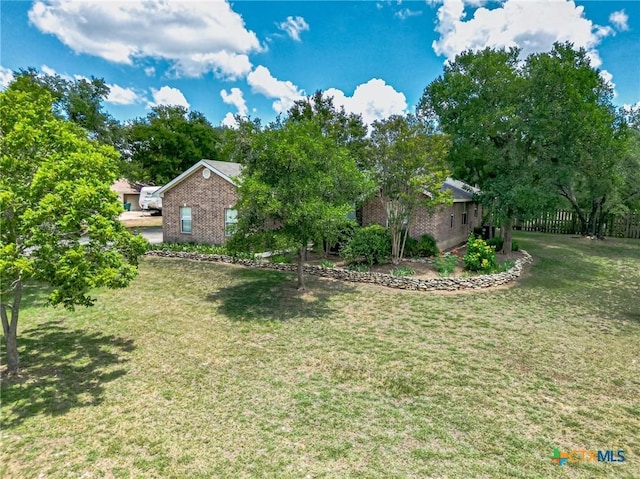 127 Maple Dr, Mountain City, TX 78610 - view of grassy yard