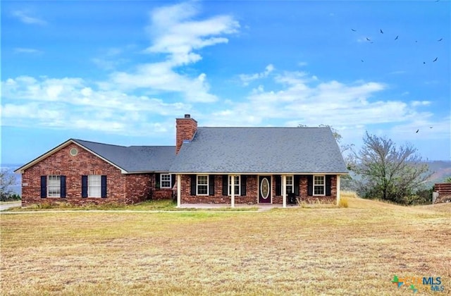 ranch-style house with a front yard