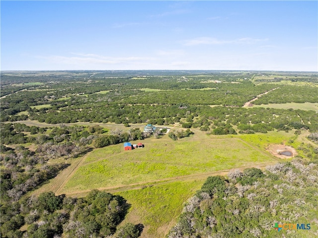 birds eye view of property with a rural view