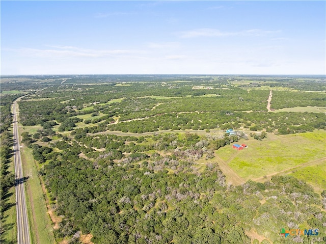 birds eye view of property featuring a rural view