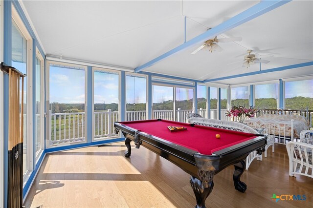 game room featuring wood-type flooring, lofted ceiling, billiards, ceiling fan, and a wall of windows