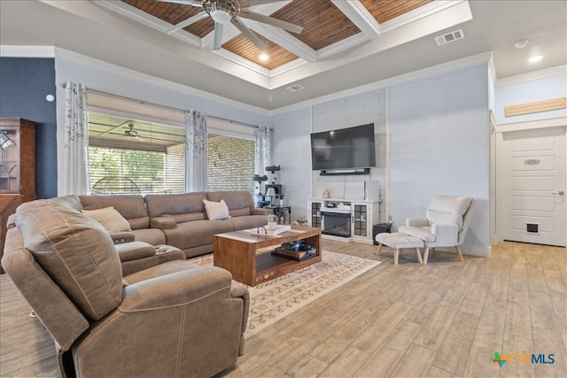 living room featuring light hardwood / wood-style floors, wood ceiling, crown molding, and coffered ceiling