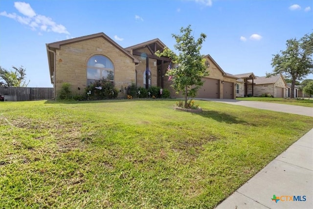 ranch-style home with a front lawn and a garage